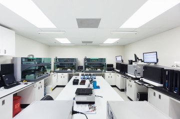 image: One of the sample processing rooms in the CLIA-certified laboratory; DNA samples are applied to 23andMe's custom genotyping array and analyzed here.