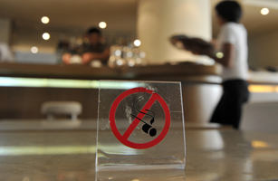 A no-smoking sign is seen in a cafe-rest