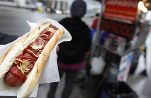 Japadog hot dog, named after Japan's figure skater Asada, is held before the Vancouver 2010 Winter Olympics