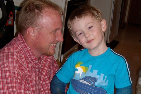 Five-year-old Garrett LeClere and his foster father Jeff McCormick are pictured in Phil Campbell