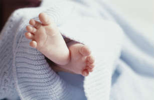 circumcision newborn baby boy feet