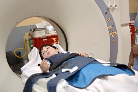 Boy in CT scanner