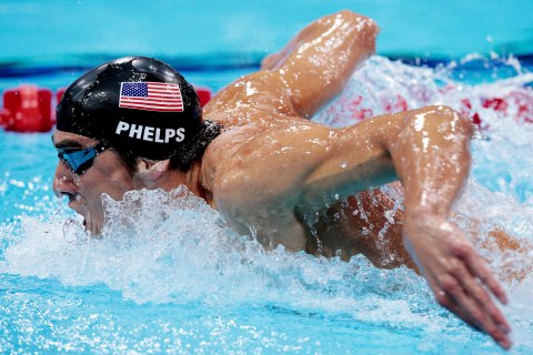 image: Michael Phelpsompetes in the Final of the Men's 400m Individual Medley on Day One of the London 2012 Olympic Games at the Aquatics Centre, July 28, 2012.