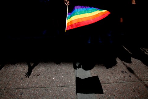 A parade goer waves a flag during 43rd annual San Francisco Lesbian, Gay, Bisexual, Transgender (LGBT) Pride Celebration & Parade, on June 30, 2013.
