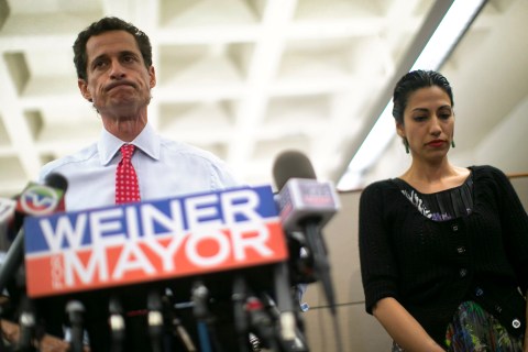 From left: New York mayoral candidate Anthony Weiner and his wife Huma Abedin attend a news conference in New York, July 23, 2013.